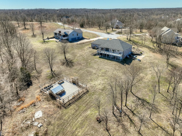 birds eye view of property featuring a rural view