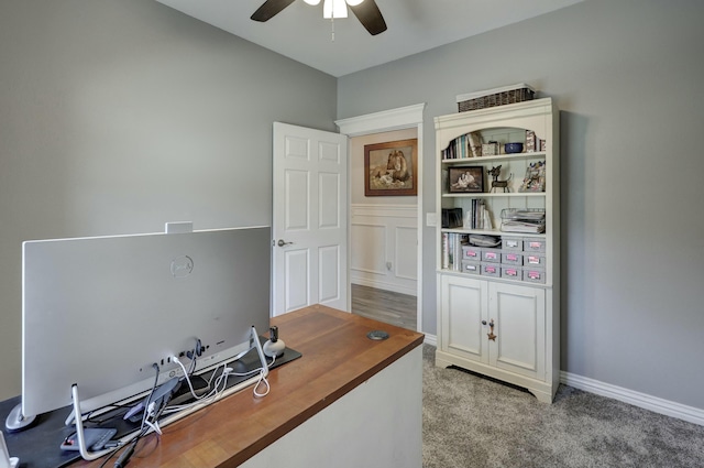 office area featuring light colored carpet and ceiling fan