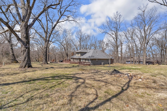 view of yard featuring a deck