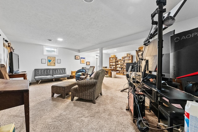 carpeted living area featuring a textured ceiling