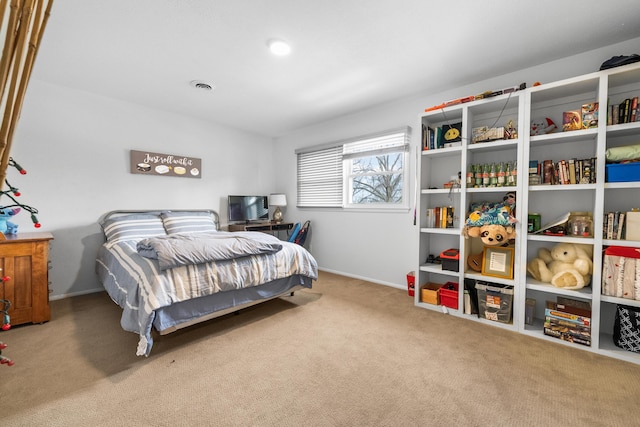 bedroom featuring carpet flooring, visible vents, and baseboards