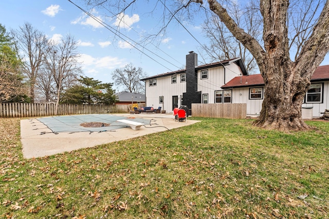 view of yard featuring a patio and fence