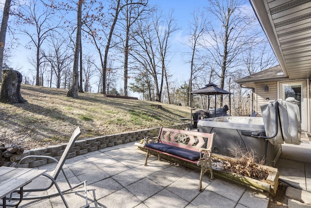 view of patio featuring a hot tub