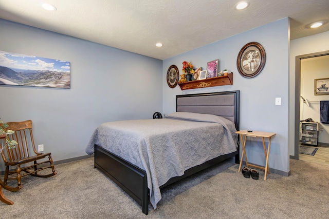 carpeted bedroom with recessed lighting and baseboards