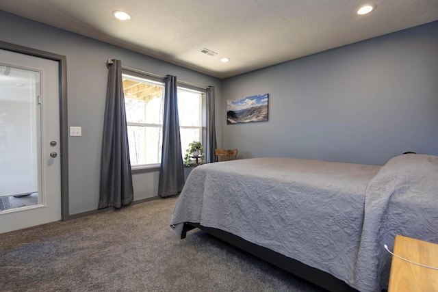 bedroom featuring recessed lighting, visible vents, and carpet floors