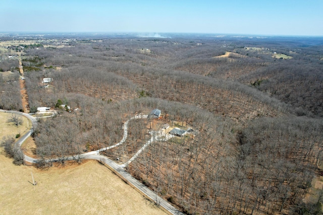 birds eye view of property featuring a rural view