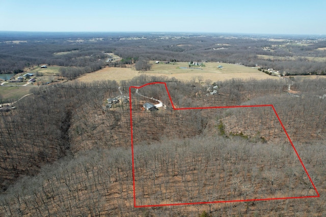 birds eye view of property featuring a rural view