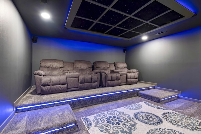 cinema with visible vents, carpet flooring, coffered ceiling, and baseboards