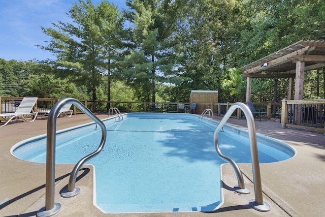 pool featuring a patio area