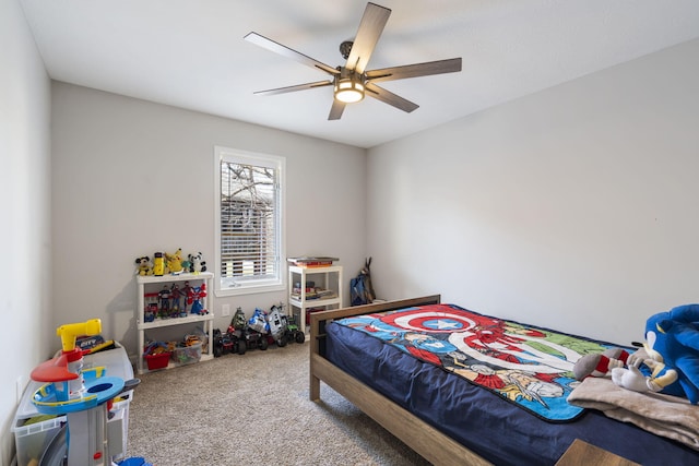 carpeted bedroom featuring ceiling fan