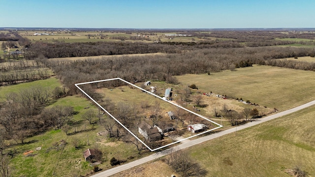 birds eye view of property featuring a rural view