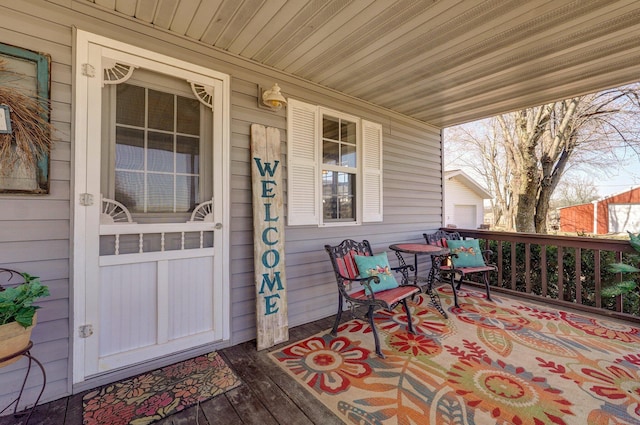 entrance to property with a porch