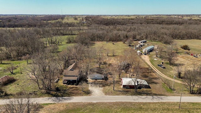 birds eye view of property featuring a rural view