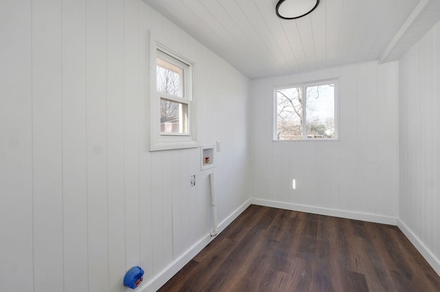 laundry room featuring washer hookup, laundry area, dark wood-style flooring, and a wealth of natural light