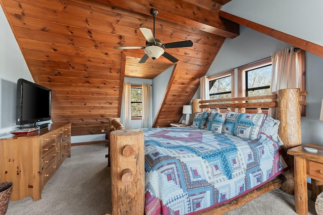 bedroom with carpet flooring, ceiling fan, vaulted ceiling with beams, and baseboards