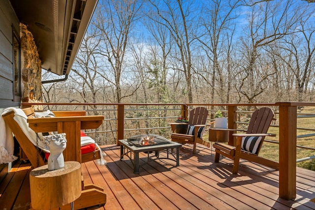 deck with an outdoor fire pit