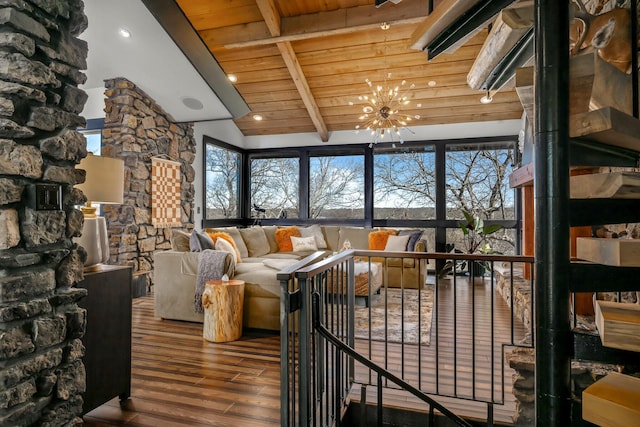 living room featuring wooden ceiling, an inviting chandelier, wood finished floors, and vaulted ceiling with beams