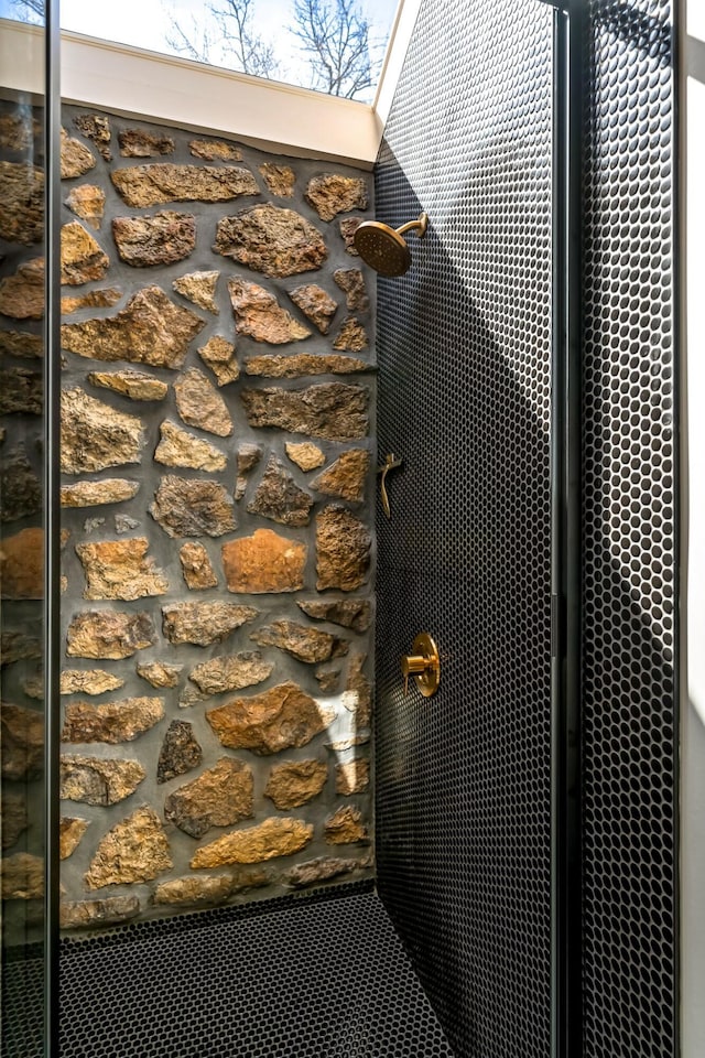 room details with a tile shower