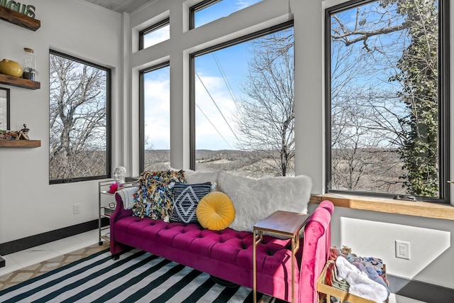 interior space with tile patterned floors and baseboards