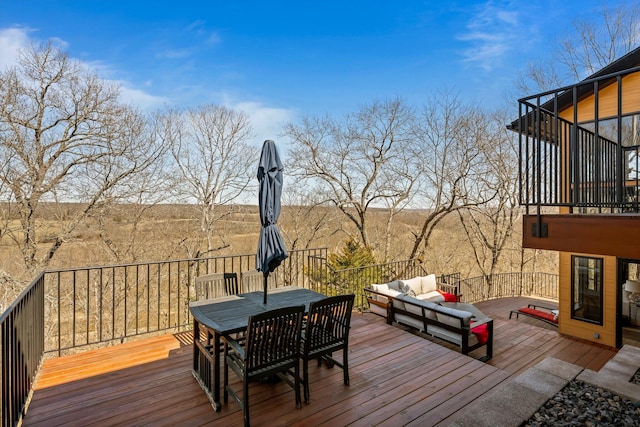 wooden deck featuring outdoor dining area and outdoor lounge area