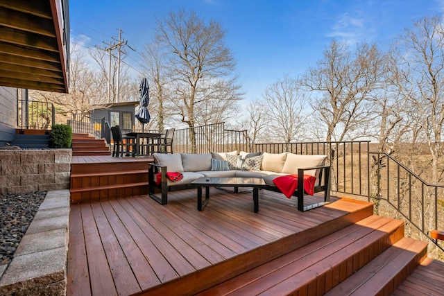 wooden deck with an outdoor hangout area