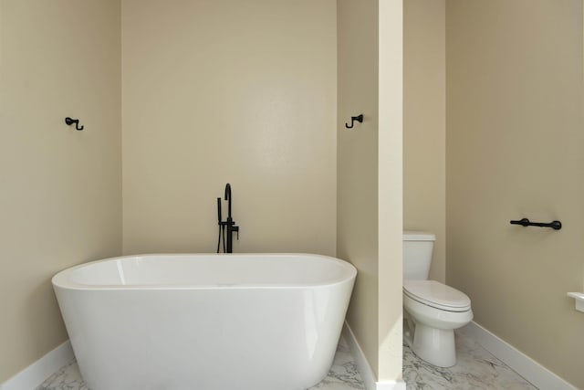 1883 S Farm Rd Unit 107, Springfield, MO 65802 - full bath featuring marble finish flooring, a freestanding tub, and toilet