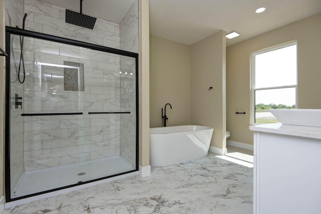 1883 S Farm Rd Unit 107, Springfield, MO 65802 - bathroom with a soaking tub, a stall shower, toilet, marble finish flooring, and baseboards