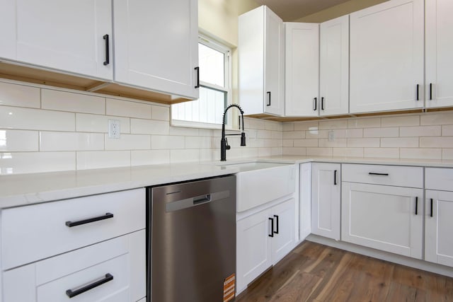 1883 S Farm Rd Unit 107, Springfield, MO 65802 - kitchen featuring stainless steel dishwasher, a sink, light countertops, white cabinetry, and dark wood-style flooring