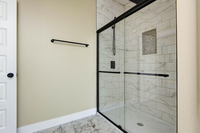 1883 S Farm Rd Unit 107, Springfield, MO 65802 - full bath featuring marble finish floors, a stall shower, and baseboards