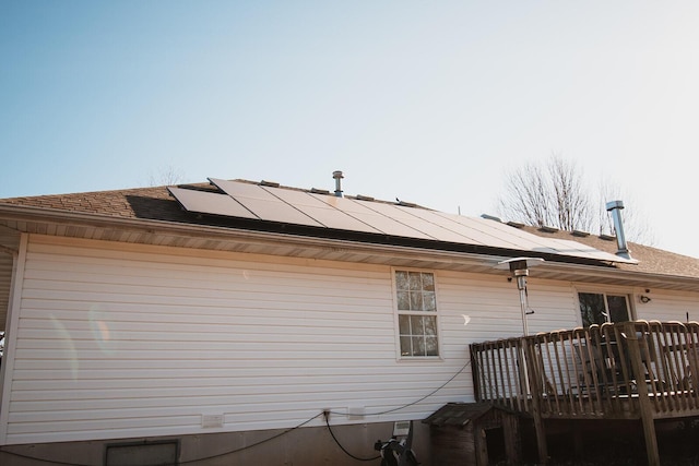 exterior space featuring solar panels