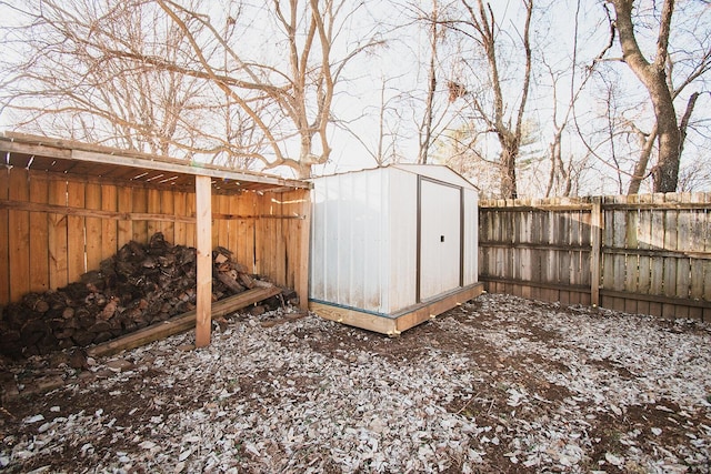 view of shed featuring a fenced backyard