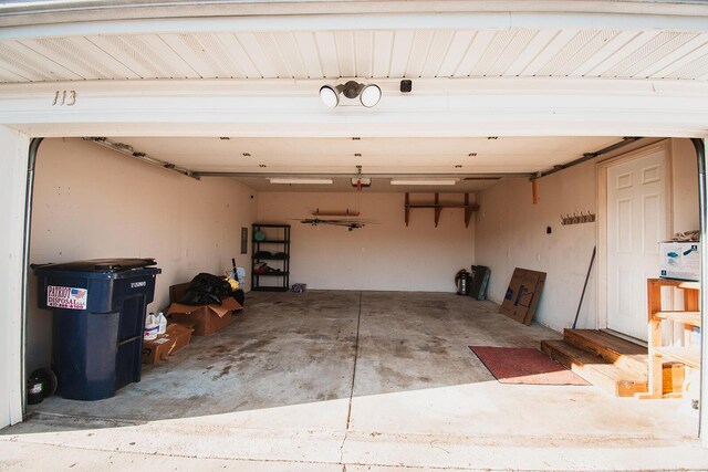 garage featuring a garage door opener