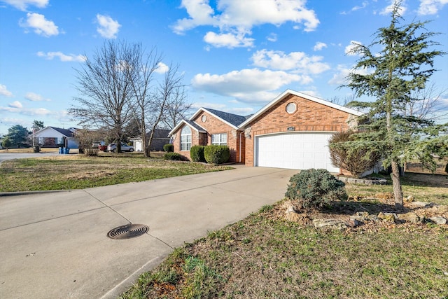 ranch-style house with a garage, a front lawn, brick siding, and driveway