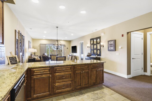201 Prairie Dunes Dr Unit 1307/1308, Branson, MO 65616 - kitchen featuring light stone counters, light colored carpet, open floor plan, and recessed lighting