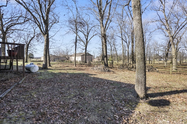 view of yard featuring fence