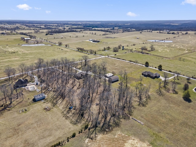 birds eye view of property featuring a rural view