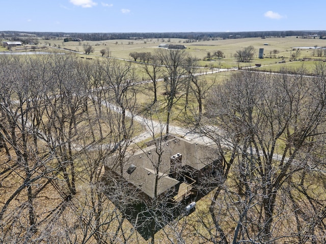 birds eye view of property featuring a rural view