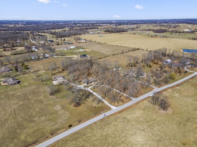 birds eye view of property featuring a rural view