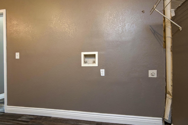 laundry area featuring hookup for a washing machine, baseboards, hookup for an electric dryer, laundry area, and a textured wall