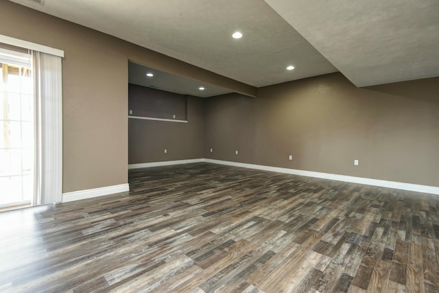 interior space featuring recessed lighting, visible vents, baseboards, and wood finished floors