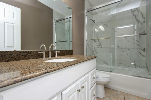 full bathroom with vanity, toilet, and enclosed tub / shower combo