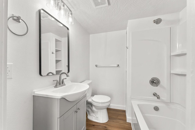 full bathroom featuring vanity, wood finished floors, visible vents,  shower combination, and toilet