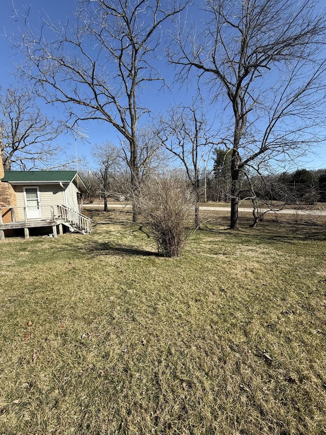 view of yard featuring a deck