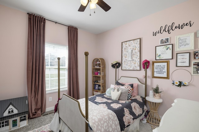 bedroom with carpet flooring, baseboards, and ceiling fan