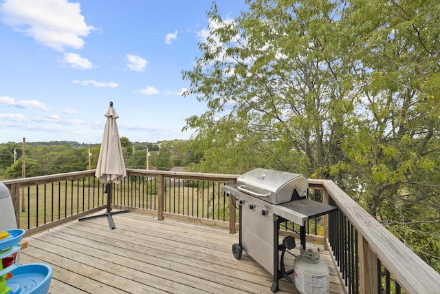 wooden terrace with grilling area