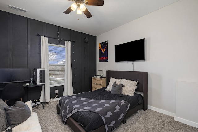 bedroom with ceiling fan, carpet, visible vents, and baseboards