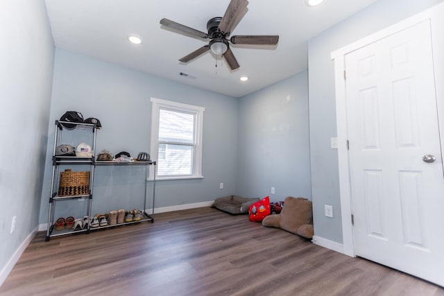 recreation room featuring recessed lighting, visible vents, wood finished floors, and a ceiling fan