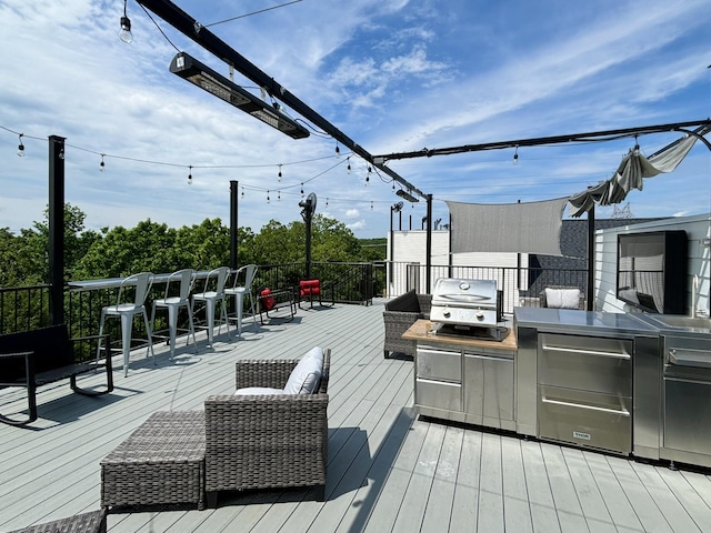 365 Majestic Dr Unit 4, Branson, MO 65616 - wooden terrace featuring grilling area and an outdoor kitchen
