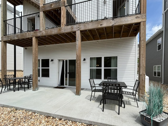 view of patio featuring outdoor dining area