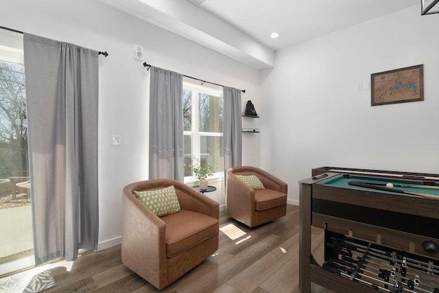 interior space with recessed lighting, wood finished floors, and baseboards